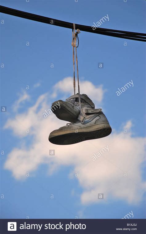 shoes hanging from power lines.